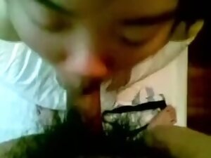 Sucking a miniature hirsute penis of my Chinese boyfriend in bed