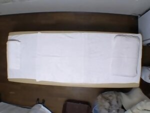 Sweet Jap girl fingered to big O in voyeur massage video