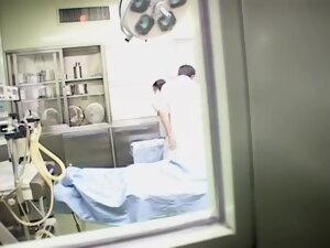 Japanese doctor and his nurse fuck in the medical department