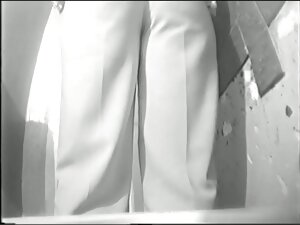 Plump bottomed Asian MILF filmed pissing on the toilet