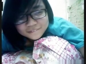Nerdy asian girl has cybersex with her bf on skype
