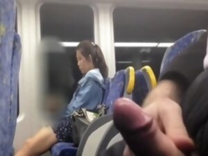 Chinese girl looking at my cock at the bus