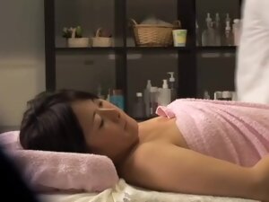 Big booty Jap babe gets some fun in voyeur massage video